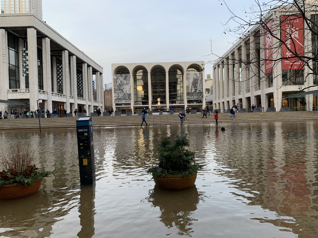 Scenes from a water main break outside Lincoln Center